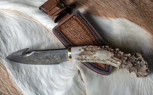 The Damascus Skinning Knife: Tools for Hunting and Kitchen