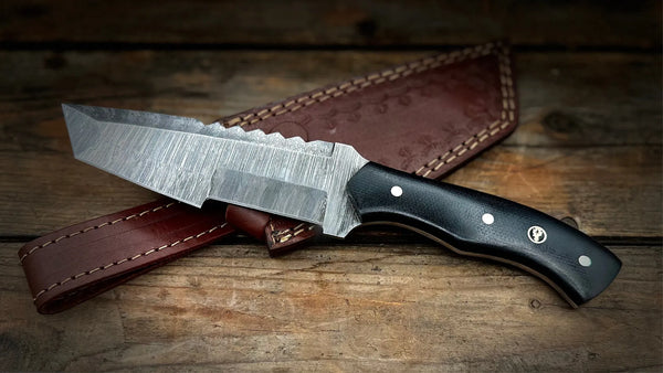 A Damascus Steel Sheath Knife for Hunting, Tracking, & More