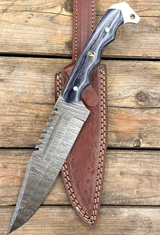 A BigHorn Steel Damascus steel knife with leather sheath