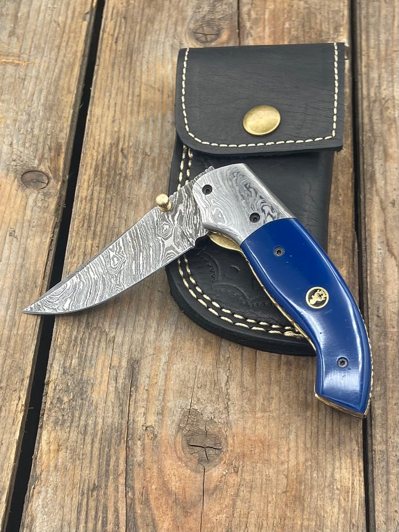 7.25" Blue Acrylic Gentleman's Damascus with Thumb Stud