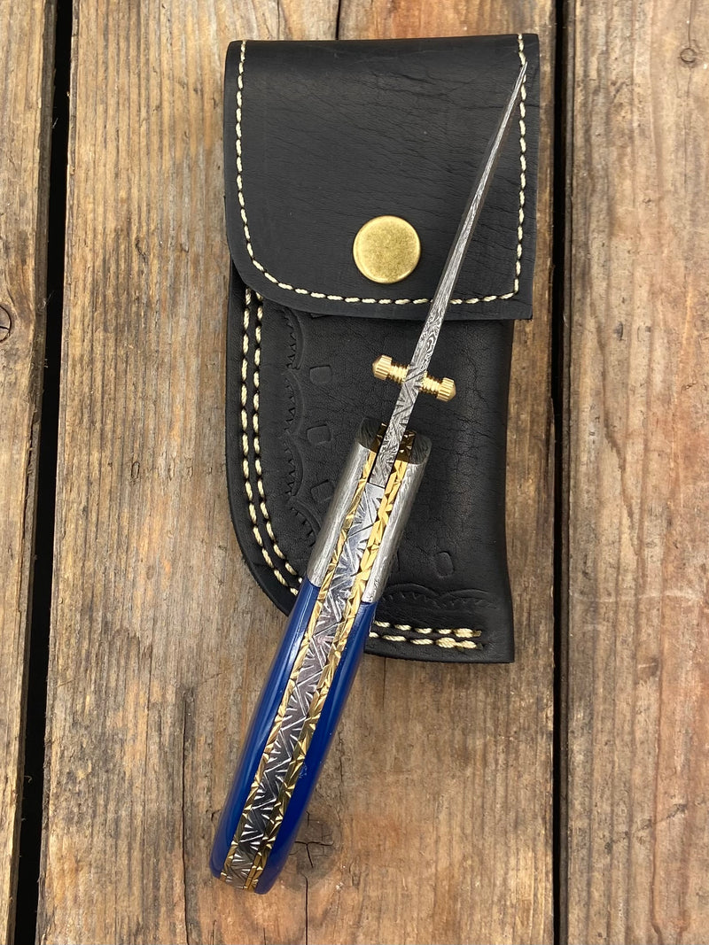 7.25" Blue Acrylic Gentleman's Damascus with Thumb Stud