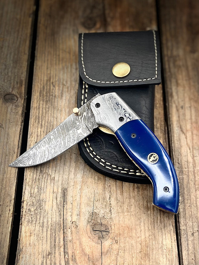 7.25" Blue Acrylic Gentleman's Damascus with Thumb Stud